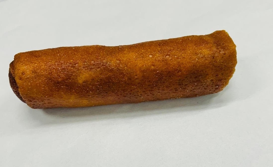 A golden fried roll fresh from the fryer
